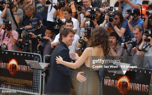 Tom Cruise with Katie Holmes arrives.