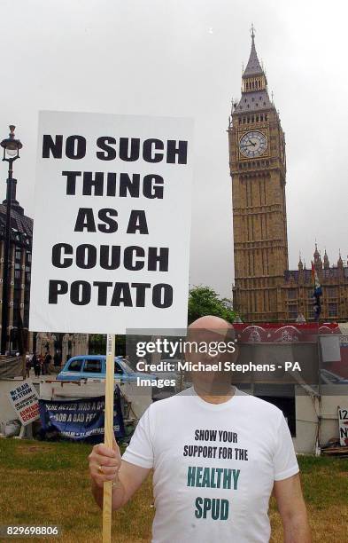 Potato supporter Mike Moran, from Brighton, protests against the term "couch potato". Farmers have launched a campaign to get the term "couch potato"...