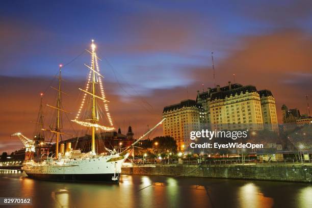 Ship ankering in Puerto Madero in front of the Edificio del Libertador building, San Telmo in the afternoon in the Opera Bay at Rio de la Plata on...