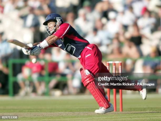 Lancashire Lightning's Brad Hodge swings at a delivery from Leicestershires Foxes' Claude Henderson.