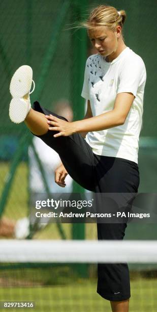 Russia's Maria Sharapova stretches.