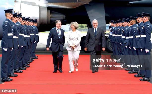 Canadian Prime Minister Paul Martin and his wife Mrs Sheila Martin are greeted by Jack McConnell , the First Minister of Scotland, at Prestwick...