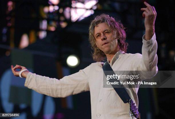 Sir Bob Geldof performs on stage.