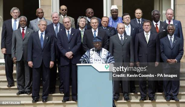 Nigerian President Olusegun Obasanjo makes a statement in front of G8 and African leaders at the end of the G8 summit in Gleneagles. Front row L to...