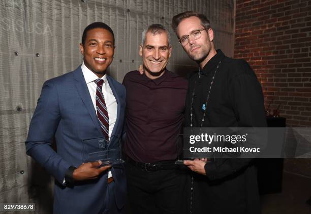 Journalist Don Lemon, editor in chief of OUT Magazine Aaron Hicklin, and musician Justin Tranter attend OUT Magazine's OUT POWER 50 gala and award...