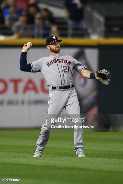 Houston Astros left fielder Derek Fisher throws the ball in during a game between the Houston Astros and the Chicago White Sox on August 9 at...