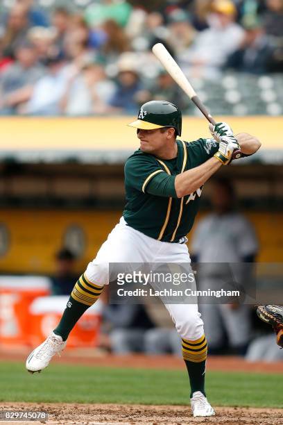 Jaycob Brugman of the Oakland Athletics at bat in the second inning against the Seattle Mariners at Oakland Alameda Coliseum on August 9, 2017 in...