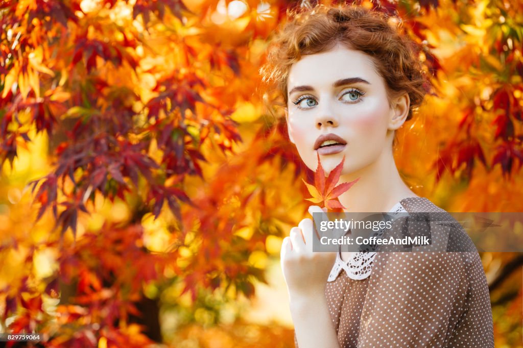 Autumn photo of beautiful girl