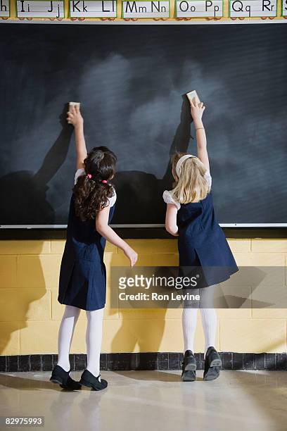 grade 1 students in classroom - blackboard qc stock pictures, royalty-free photos & images