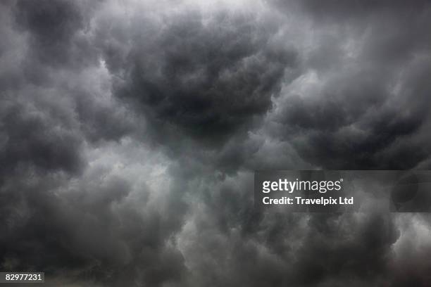 stormy clouds - stormy sky stock pictures, royalty-free photos & images