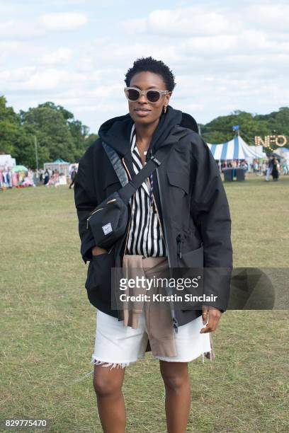 Accessories Editor at Elle Uk Donna Wallace wears Sorel boots, Herschel bag, Malene Birger shirt on day 4 of Wilderness Festival on August 6, 2017 in...