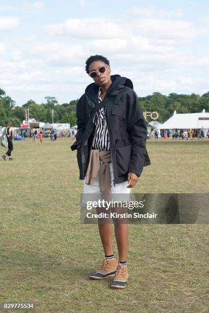Accessories Editor at Elle Uk Donna Wallace wears Sorel boots, Herschel bag, Malene Birger shirt on day 4 of Wilderness Festival on August 6, 2017 in...
