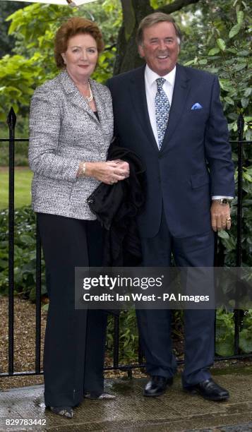 Sir Terry Wogan and wife Helen arrive at Sir David Frost's Summer Garden Party, in Carlyle Square, west London. Picture date: Wednesday July 9, 2008....