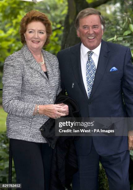 Sir Terry Wogan and wife Helen arrive at Sir David Frost's Summer Garden Party, in Carlyle Square, west London. Picture date: Wednesday July 9, 2008....