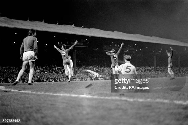 Chelsea's John Dempsey , Peter Osgood and Peter Houseman celebrate the winning goal as Leeds United's David Harvey , Allan Clarke and Jack Charlton...