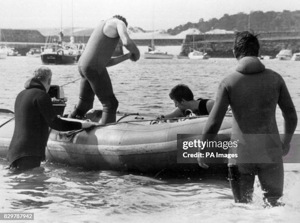 Police frogmen search the area where Lord Mountbatten was killed when an IRA bomb destroyed his boat off the coast of County Sligo, Ireland. Thomas...