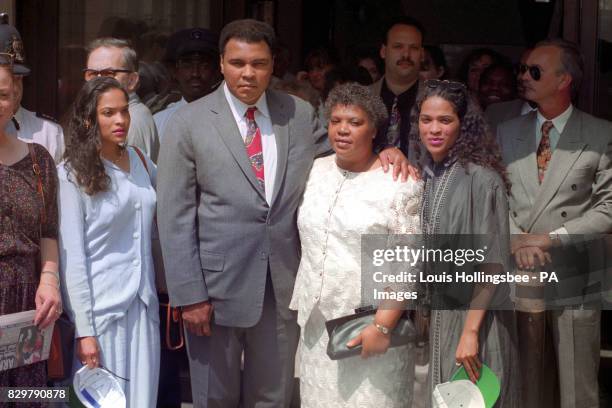 Muhammed Ali outside St Bartholomew's Hospital, London, after visiting fellow boxer Michael Watson with his twin daughters, Rasheeda and Jamillah,...