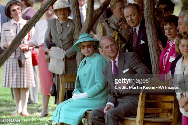 Queen Elizabeth II and the Duke of Edinburgh watch a presentation at Bugac on the Hungarian plains, during their State Visit to Hungary.