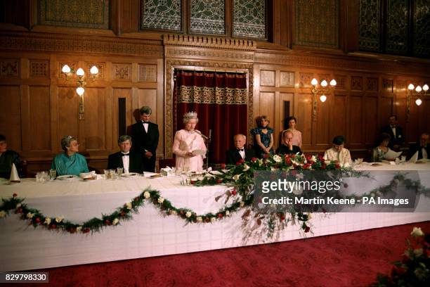 Queen Elizabeth II delivers a speech at the state banquet at Budapest's Parliament during her state visit.