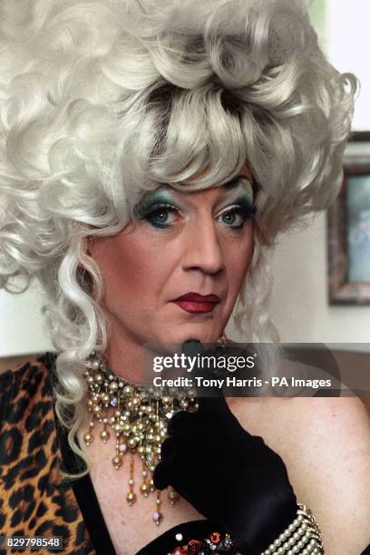 PAUL O'GRADY ALIAS FEMALE IMPERSONATOR, LILY SAVAGE AT HIS HOME, A COUNCIL FLAT IN SOUTH LONDON.