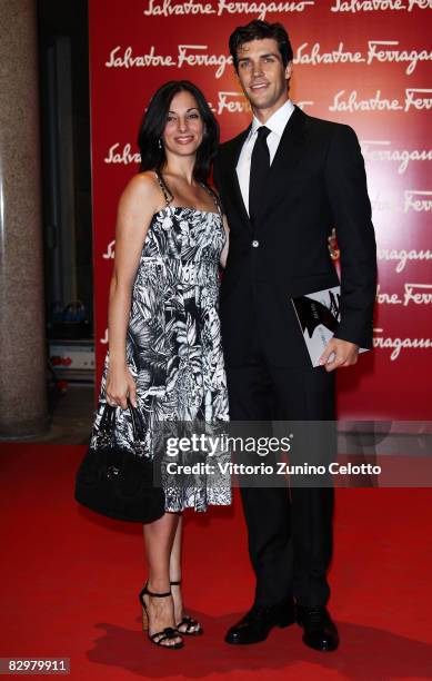 Roberto Bolle and Beatrice Carbone attends 'Salvatore Ferragamo Evolving Legend' exhibition opening during Milan Fashion Week Spring/Summer 2009 on...