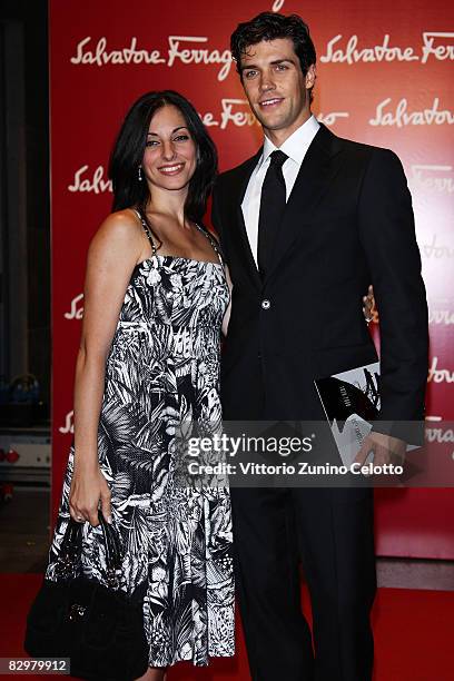 Roberto Bolle and Beatrice Carbone attends 'Salvatore Ferragamo Evolving Legend' exhibition opening during Milan Fashion Week Spring/Summer 2009 on...