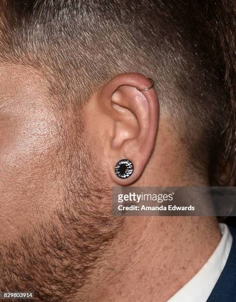 Singer Adam Lambert, earring detail, arrives at OUT Magazine's Inaugural POWER 50 Gala & Awards Presentation at Goya Studios on August 10, 2017 in...