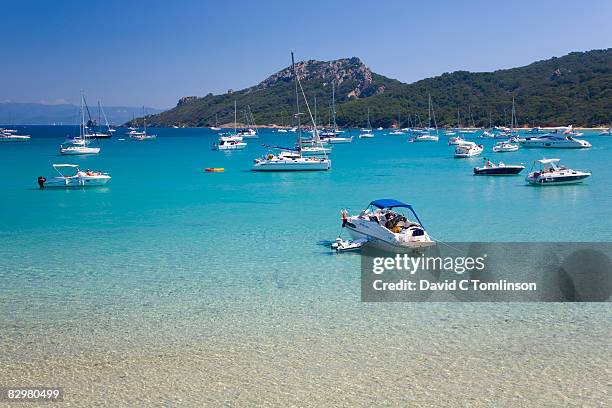 boats off notre dame beach, porquerolles, france - porquerolles photos et images de collection