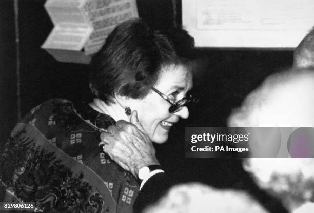 RUFINA PHILBY, WIFE OF KGB SUPERSPY KIM PHILBY, ATTENDS A SALE OF HIS PERSONAL POSSESSIONS AT SOTHEBY'S IN LONDON.