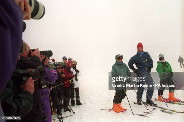 PRINCE OF WALES WITH HIS SONS PRINCE WILLIAM [L] & PRINCE HARRY DURING AN INFORMAL PHOTOCALL ON THE PISTES OF THE MADRISA MOUNTAIN ABOVE THE...