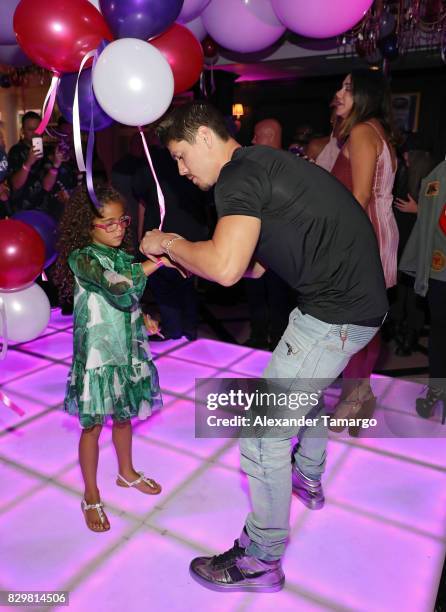 Bryan Tanaka and Mariah Carey's daughter Monroe attend the Mariah Carey concert after party at Sugar Factory American Brasserie on Ocean Drive on...