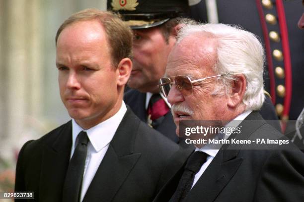 Prince Rainier with his son Prince Albert of Monaco attend the funeral of the late King Baudouin of the Belgians at St. Michel's Cathedral, Brussels