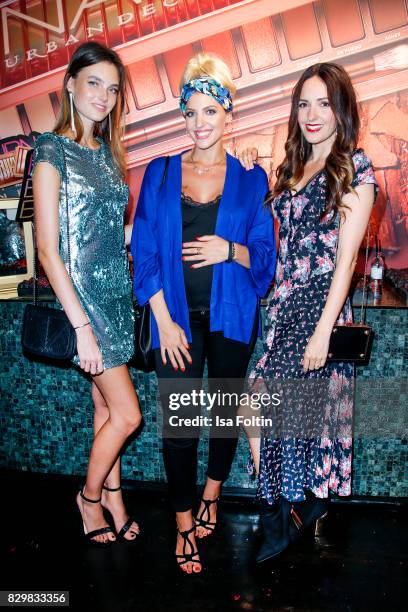 Germany next topmodel winner Celine Bethmann, model and Style-Influencer Sarah Nowak and German presenter Johanna Klum during the Urban Decay Naked...