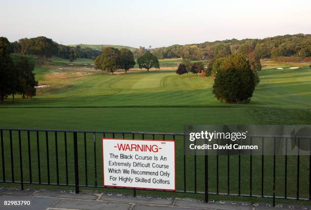 Warning sign welcomes golfers who dare beside the tee on the par 4, 1st hole on the Black Course at Bethpage State Park, venue for the 2009 US Open...