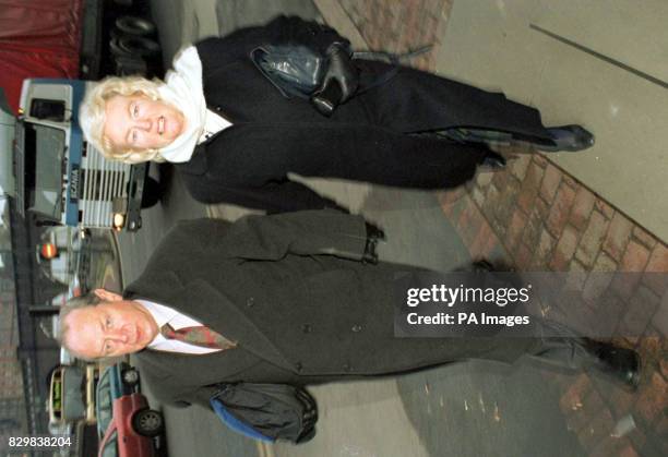 Consultant surgeon Reginald Dixon and wife arrive at Nottingham Crown Court Thursday morning before being cleared of illegally procuring an abortion....