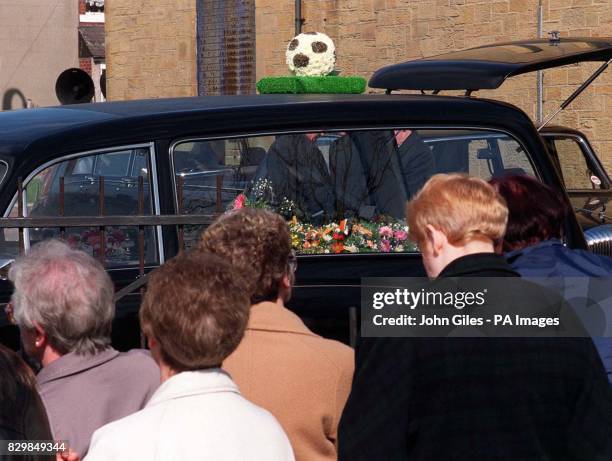 Farewell to Cissie Charlton from the peole of Ashington today with flowers in the shape of a football.