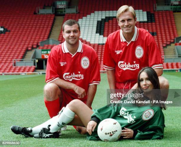 Liverpool FC launch their new strip with the help of page three girl, Kathy Lloyd, a Liverpool lass. John Scales and Steve Harkness model the kit...