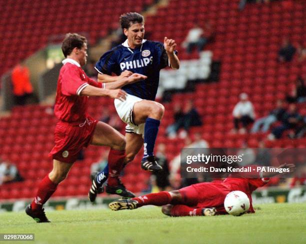 Liverpool V PSV Eindhoven. PSVs Luc Nilis avoids a tackle from Liverpools Phil babb and tries a shot at goal in the Jan Molby Testimonial at Anfield....
