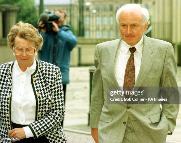 Huddersfield farmr Kenneth Hall leaves Bradford Crown Court with his wife Audrey during his trial for shooting and wounding an intruder near his...