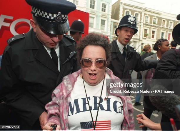 American tourist Maureen Wilding from Billings, Montana, among the crowd following her hug with the Princess of Wales outside the London Lighthouse,...
