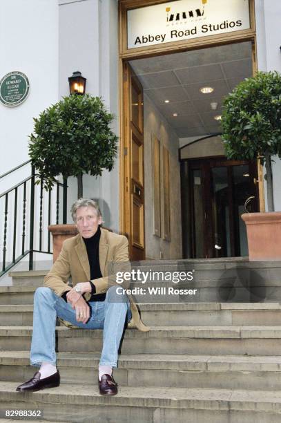 Roger Waters of Pink Floyd sitting outside Abbey Road Studios, London, circa 2001.