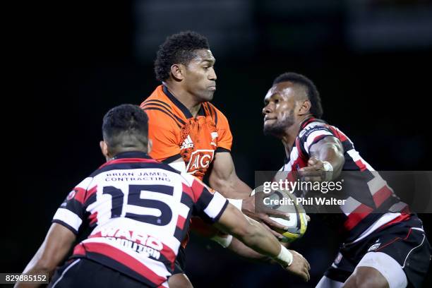 Waisake Naholo of the All Blacks is tackled during the Game of Three Halves between the All Blacks and Counties at ECOLight Stadium on August 11,...