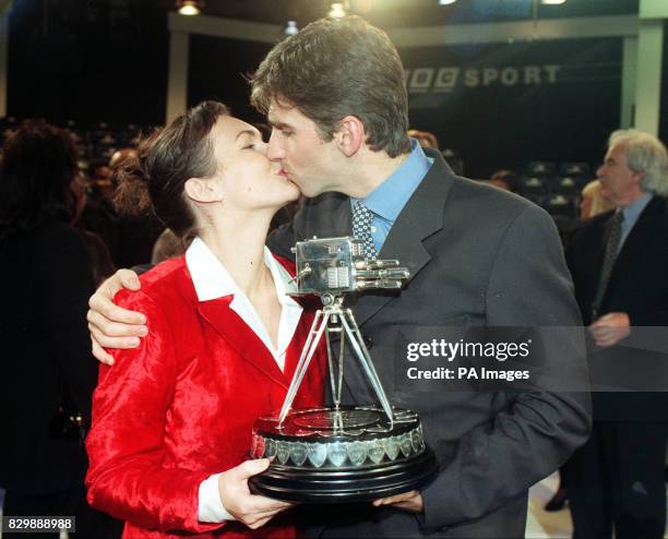 World motor racing champion Damon Hill kisses his wife Georgie after being named BBC Sports Personality of the Year tonight . Hill won the coveted...