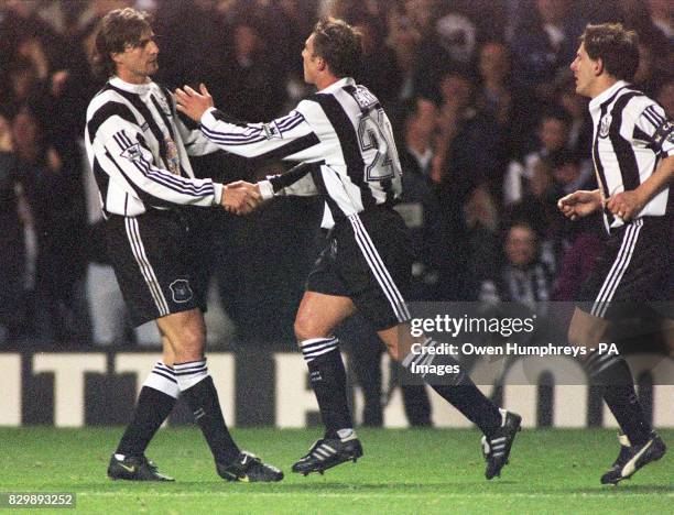 Lee Clark is congratulated by David Ginola and Peter Beardsley after scoring Newcastle United's first goal against Charlton in the FA Cup third round...