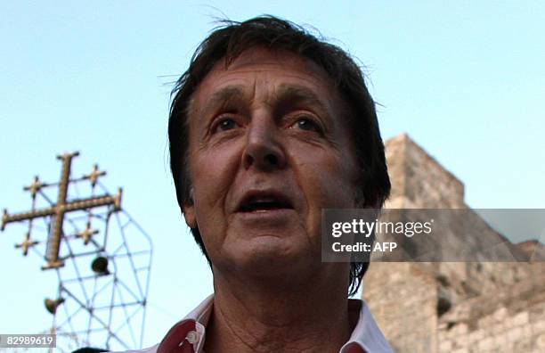 Pop star Paul McCartney, one of two surviving members of the Beatles, visits the Church of Nativity in the West Bank city of Bethlehem on September...