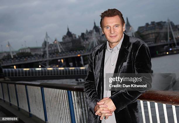 Actor Liam Neeson poses by the River Thames before the opening night gala screening of 'Taken' on September 24, 2008 in London, England.