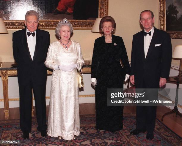 Israeli President Mr Ezer Weizman and his wife Reuma pose with the Queen and Duke of Edinburgh after hosting a return banquet on the final day of his...
