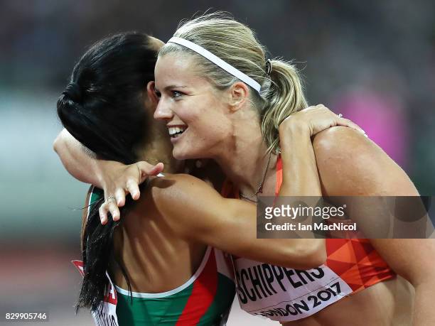 Dafne Schippers of Netherlands and Ivet Lalova-Collio compete in the Women's 200m semi finals during day seven of the 16th IAAF World Athletics...