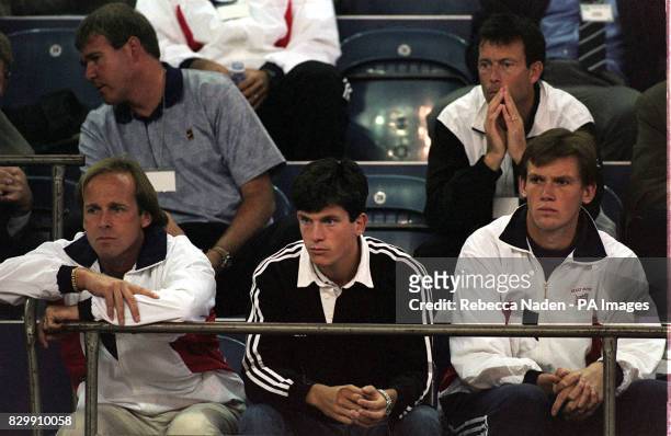 John Lloyd, Tim Henman and Andrew Richardson watch British Davis Cup player, Jamie Delgado with Jeremy Bates , during his match against Wayne Black...