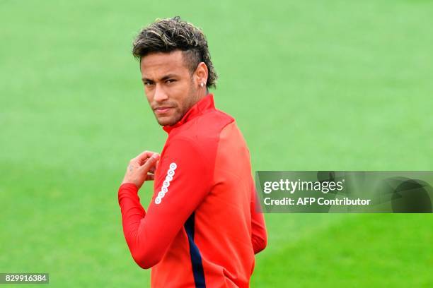 Paris Saint-Germain's Brazilian forward Neymar attends a training session at the Camp des Loges in Saint-Germain-en-Laye, near Paris, on August 11,...